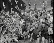 Hitler Youth Boys Engaging in Sporting Activities at a Camp, 1930s. Creator: British Pathe Ltd