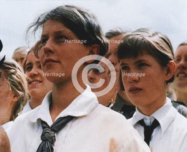 Hitler Youth Listening to a Speech, 1930s. Creator: British Pathe Ltd.