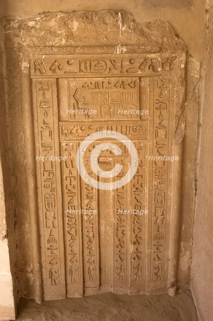 Hieroglyphic writing and deceased ofering food to the gods, Necropolis of Saqqara, Egypt, 2003. Creator: Unknown.