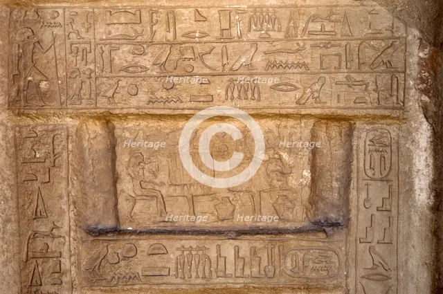 Hieroglyphic writing and deceased ofering food to the gods, Necropolis of Saqqara, Egypt, 2003. Creator: Unknown.
