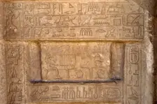 Hieroglyphic writing and deceased ofering food to the gods, Necropolis of Saqqara, Egypt, 2003. Creator: Unknown