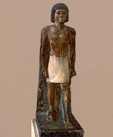 Hieratic statue of a man, made in polychromed limestone
