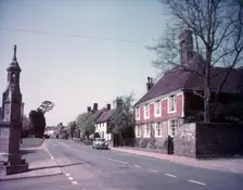 High Street and war memorial, Burwash, Sussex, c1955. Creator: Arthur Charles Kirby Ware