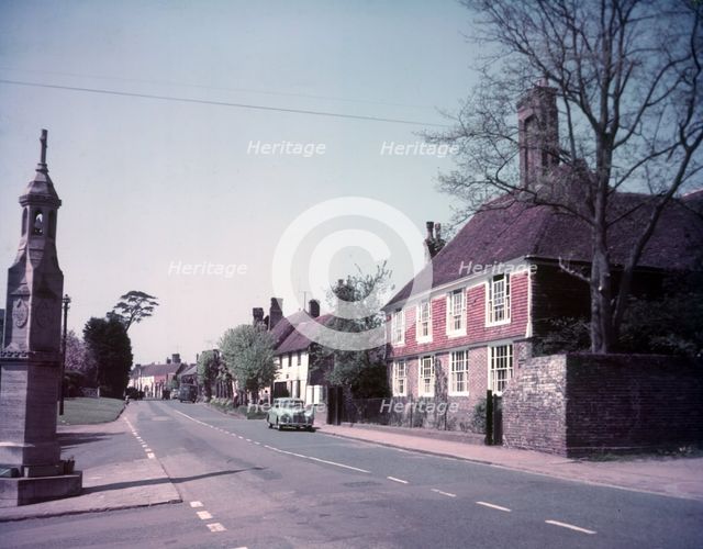 High Street and war memorial, Burwash, Sussex, c1955. Creator: Arthur Charles Kirby Ware.