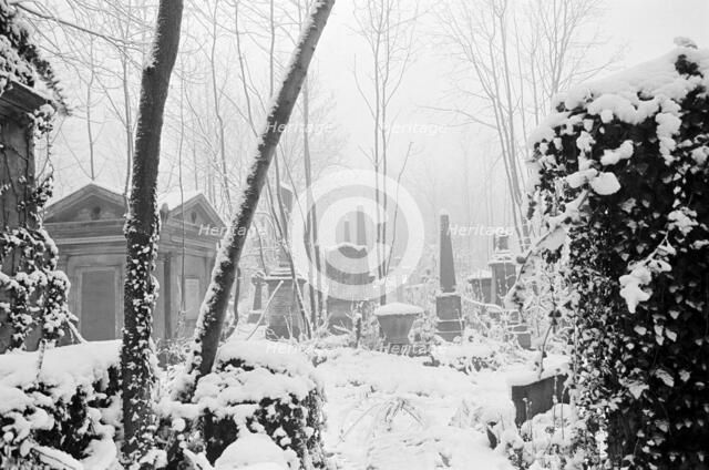 Highgate Cemetery, Hampstead, London, winter 1982. Artist: John Gay.