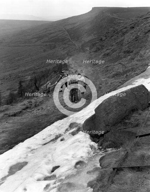 Hikers on Stanage Edge, Hathersage, Derbyshire, 1964.  Creator: Michael Walters.