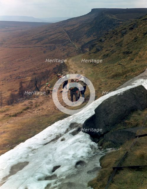 Hikers on Stanage Edge, Hathersage, Derbyshire, 1964.  Creator: Michael Walters.