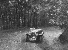 Hillman Aero Minx competing in the B&HMC Brighton-Beer Trial, Fingle Bridge Hill, Devon, 1934. Artist: Bill Brunell