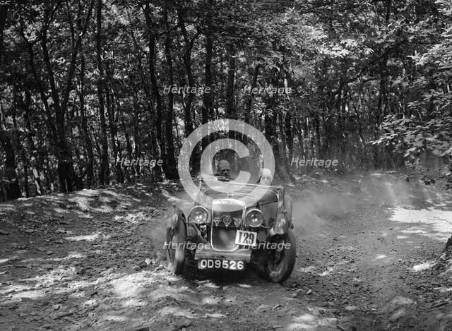 Hillman Aero Minx competing in the B&HMC Brighton-Beer Trial, Fingle Bridge Hill, Devon, 1934. Artist: Bill Brunell.