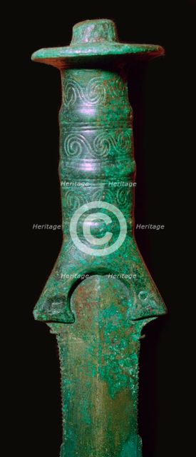 Hilt of an early bronze sword, 13th century BC.