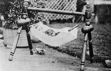 Hindu baby and cradle, India, 20th century