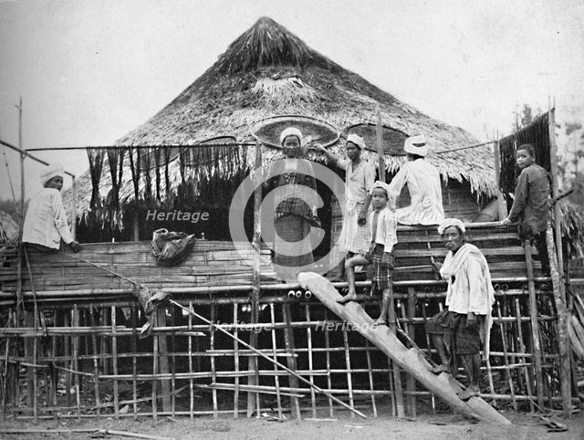 Hindu fakirs and a native dwelling, 1902. Artist: Bourne & Shepherd.