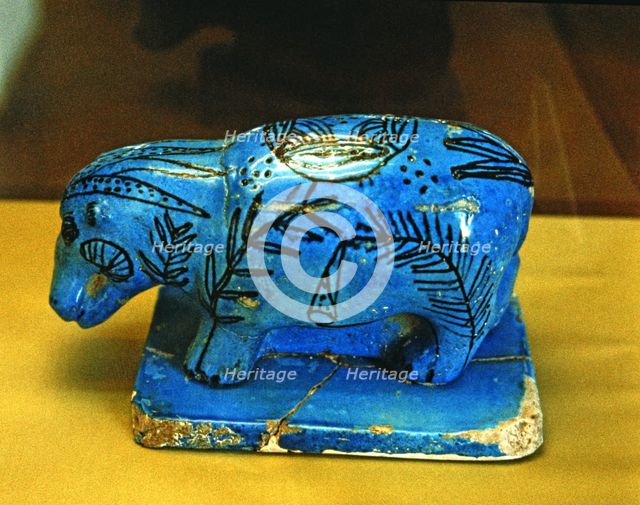 Hippo, blue glazed ceramic figurine, side view.