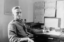 Hiram Bingham, Aviator - At Desk, 1917. Creator: Harris & Ewing