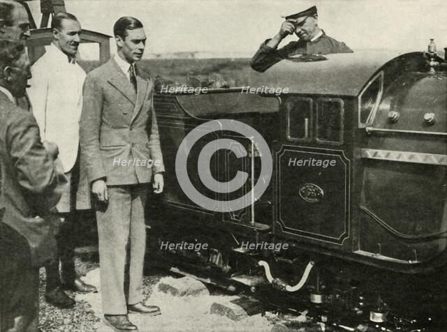 'His Majesty Inspecting The Miniature Railway at New Romney, Kent, 1926', 1937. Creator: Unknown.