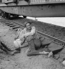His family traveled with him on the freights, Washington, Toppenish, Yakima Valley, 1939. Creator: Dorothea Lange
