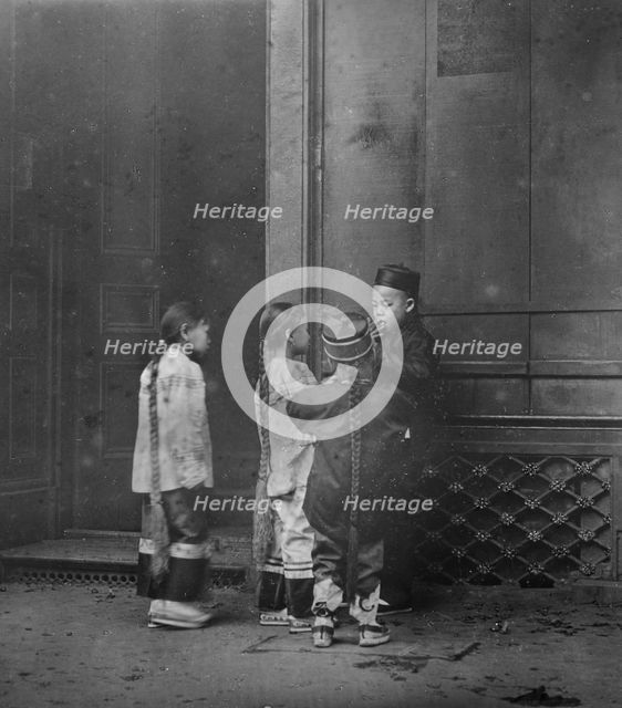 His first cigar, Chinatown, San Francisco, between 1896 and 1906. Creator: Arnold Genthe.