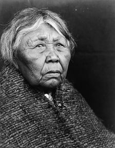 Hleastunuh-Skokomish, Indian women, head-and-shoulders portrait, facing right, c1913. Creator: Edward Sheriff Curtis