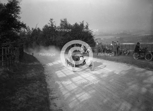 HR Godfrey driving a GN Bluebottle, Inter-Varsity Hillclimb, Tring, Hertfordshire, 5 March 1921. Artist: Bill Brunell.