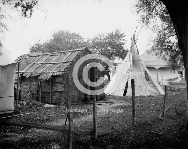 Hut and tepee, probably St. Clair Flats, Mich., between 1900 and 1920. Creator: Unknown.