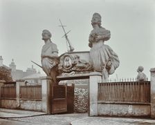 Huge figureheads at Castle's Ship Breaking Yard, Westminster, London, 1909
