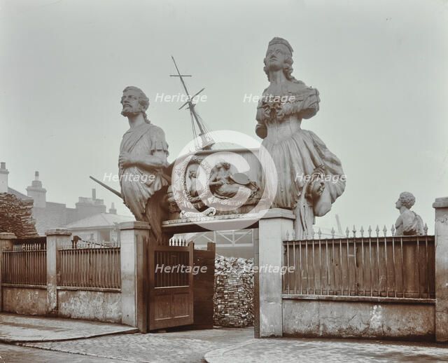 Huge figureheads at Castle's Ship Breaking Yard, Westminster, London, 1909. Artist: Unknown.