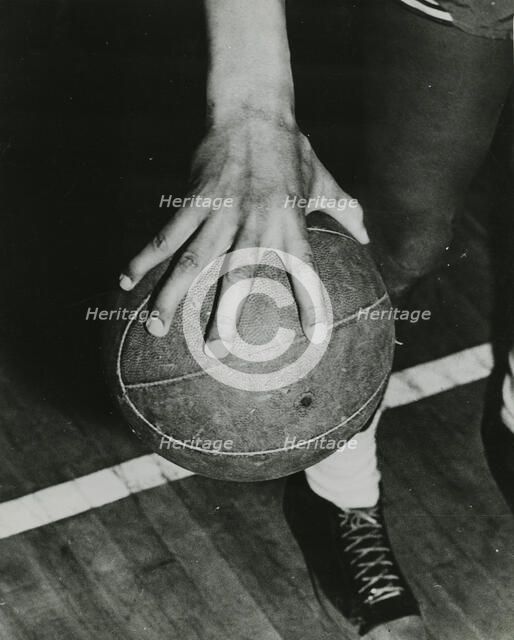 Huge hand span makes ball handling easy, 1947. Creator: Unknown.