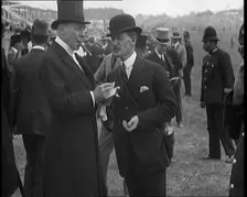 Hugh Cecil Lowther, 5th Earl of Lonsdale, Wearing a Top Hat Smoking a Cigar at a Horse racing Event, Creator: British Pathe Ltd