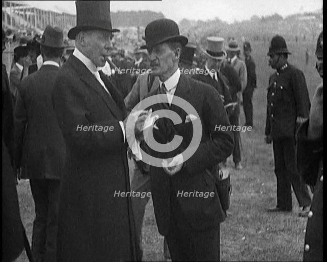 Hugh Cecil Lowther, 5th Earl of Lonsdale, Wearing a Top Hat Smoking a Cigar at a Horse racing Event, Creator: British Pathe Ltd.