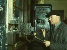 Hump master in a Chicago and North Western railroad yard operating a signal..., Chicago, Ill., 1942. Creator: Jack Delano