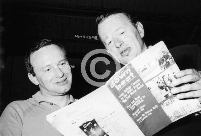 Humphrey Lyttleton and Alex Welsh reading a copy of Down Beat magazine, 1963. Creator: Brian Foskett.