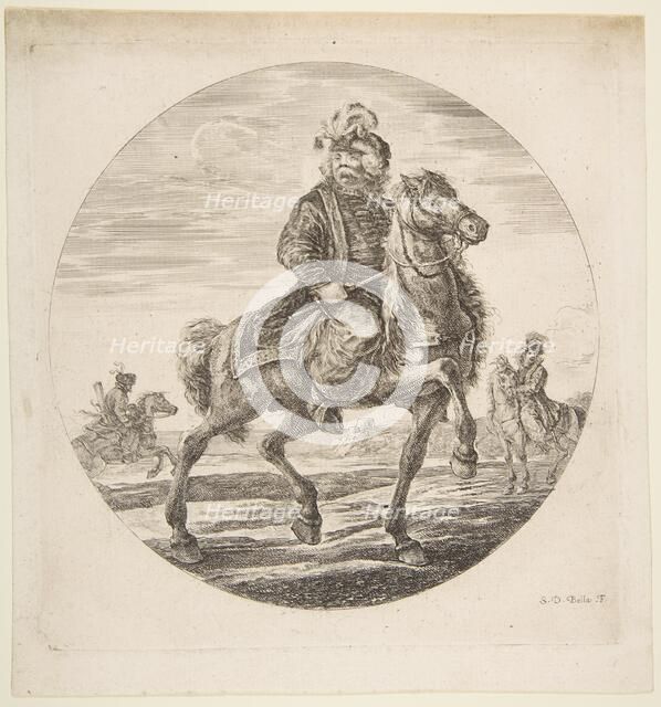 Hungarian horseman riding towards the right, other horsemen in the background, a circu..., ca. 1651. Creator: Stefano della Bella.