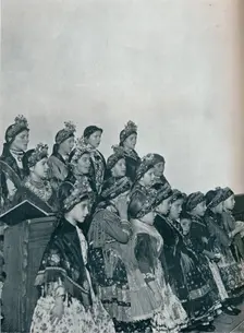 Hungarian Peasant Girls Singing in Church c1932. Artist: Rudolf Balogh