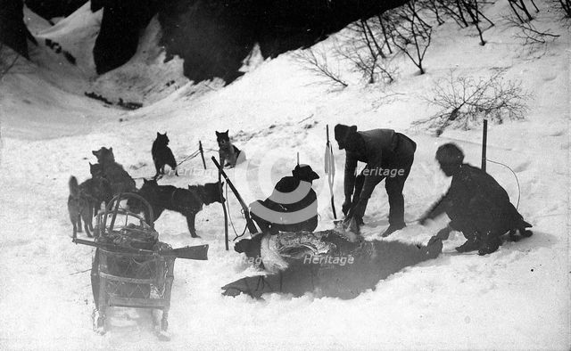 Hunters with a dead bear, 1910-1929. Creator: Ivan Emelianovich Larin.