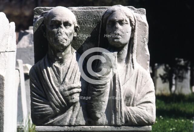 Husband and wife on Roman gravestone. Artist: Unknown.