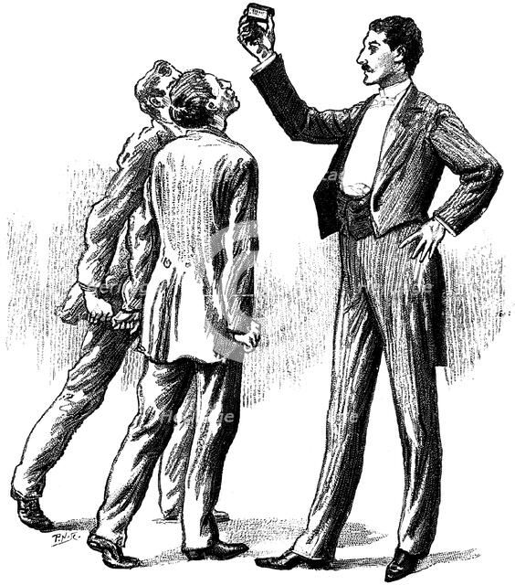 Hypnotised subjects attracted by a matchbox, 1891. Artist: Unknown