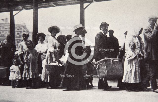 Immigrants arriving at Ellis Island, New York City, USA, c1905.  Creator: Unknown.