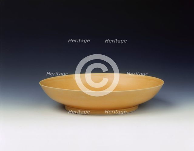 Imperial yellow glazed saucer, Yongzheng period, Qing dynasty, China, 1723-1735. Creator: Unknown.