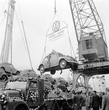 Imported Volkswagen Beetles arriving in Sweden, Landskrona harbour, 1961. Creator: Unknown