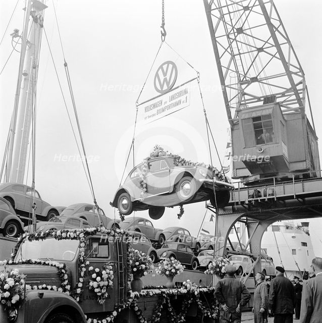 Imported Volkswagen Beetles arriving in Sweden, Landskrona harbour, 1961. Artist: Unknown