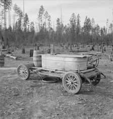 Improved water tank on stump ranch, Boundary County, Idaho, 1939. Creator: Dorothea Lange