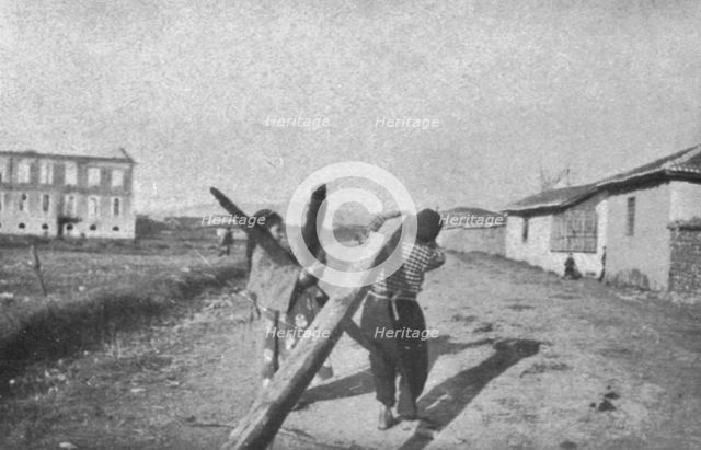 ''Impressions Macedoniennes; enfants de Guevgueli sauvant des madriers de l'incendie.', 1915. Creator: Unknown.