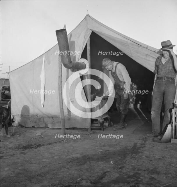 In a carrot pullers' camp near Holtville, California, 1939. Creator: Dorothea Lange.