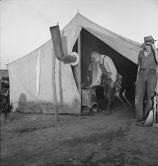 In a carrot pullers camp near Holtville, California, 1939. Creator: Dorothea Lange