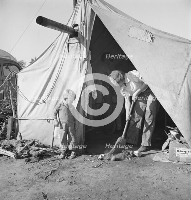In a carrot pullers' camp near Holtville, California, 1939. Creator: Dorothea Lange.