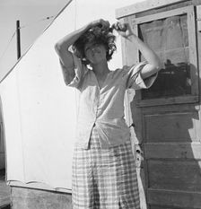 In a carrot pullers camp near Holtville, Imperial Valley, California, 1939. Creator: Dorothea Lange