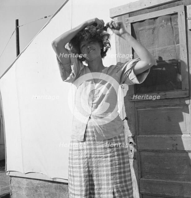 In a carrot pullers' camp near Holtville, Imperial Valley, California, 1939. Creator: Dorothea Lange.