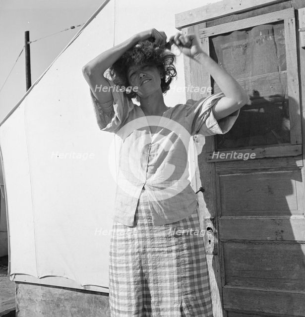 In a carrot pullers' camp near Holtville, Imperial Valley, California, 1939. Creator: Dorothea Lange.