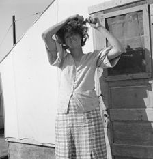 In a carrot pullers camp near Holtville, Imperial Valley, California, 1939. Creator: Dorothea Lange