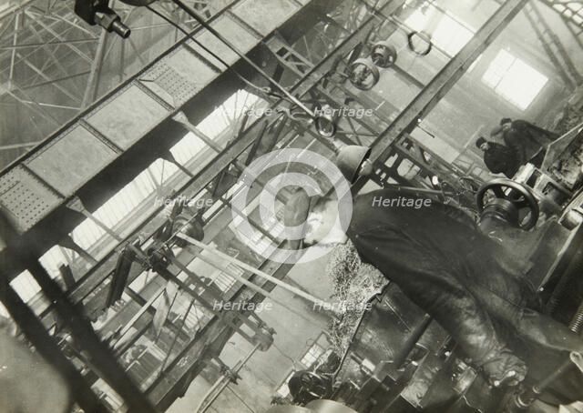 In a mechanical engineering factory, USSR, 1930s. Artist: Unknown